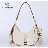 ราคา กระเป๋าทรงพอช แบรนด์แท้ TTWN BEAR สะพายข้างสายสปอร์ต ผ้าทอลายTปักหมี มีใบลูก1ใบ (22778531700)