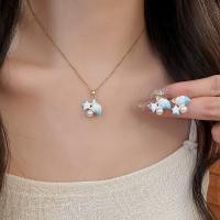 ราคา ชุดเครื่องประดับสไตล์โอเชียนดอล핀 สำหรับผู้หญิง สร้อยคอมิกกี้ต่างหูสีฟ้าและขาวเคลือบทอนทอง หวานๆ ใส่ได้ทุกวัน เหมาะสำหรับวันพักผ่อนบนชายหาด (54458287255)