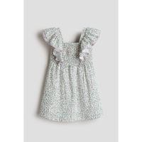 ราคา H&M(เอชแอนด์เอ็ม) เดรสแต่งระบายและผ้าระบายยืดรอบเอว Girls Smocked flounce-trimmed dress 1326716_1 (43476766859)