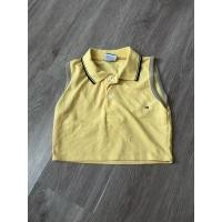 ราคา เสื้อโปโลแขนกุด ทรงครอป Tommy Hilfiger (43622101647)