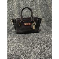 ราคา แท้ coach swagger mini 8” มือสอง (29804692120)