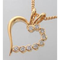ราคา จิวเวอร์รี่มือสอง ของแท้ จี้ห้อยคอทองคำรูปทรงหัวใจประดับเพชรแท้ 9 เม็ด รวมน้ำหนัก 0.15 กะรัต (49862559580)