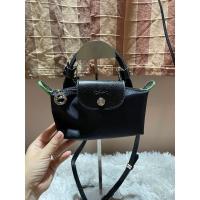 ราคา กระเป๋า Longchamp งานลุ้นมือสอง Le Pliage Pouch With Handle สีดำเขียว (26467928743)