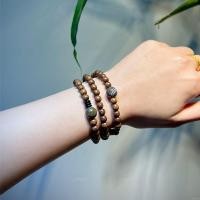 ราคา สร้อยข้อมือลูกปัดไม้จันทน์ทองไม้จันทน์ไม้อินเทรนด์ผู้ชายผู้หญิงคู่ลูกปัดไม้สร้างสรรค์สร้อยข้อมือโบราณ 6.9.เช่น (43981562474)