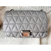 ราคา กระเป๋า MK michael kors สีเทา มือสอง (21977612472)