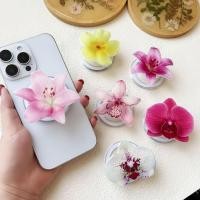 ราคา ที่วางโทรศัพท์แม่เหล็กอะคริลิคดอกลิลลี่สีชมพูสำหรับเคส Magsafe และที่วางแหวนรองรับเดสก์ท็อป (27586632785)