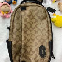 ราคา คาดอก ลายซีน้ำตาล Coach USA แท้ 100% (7724415763)