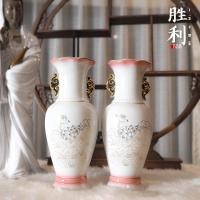 ราคา (พรีเมี่ยมขายเป็นคู่) แจกันสีขาว ตัดสีชมพู เดินเส้นทองลายดอกบัว ด้านหลังอักษรจีน งานกระเบื้องดินเผาจากจีน สูงขนาด 10นิ้ว (11701526285)