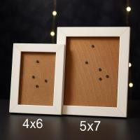ราคา กรอบรูป 4x6 , 5x7 ตั้งโต๊ะ แขวนผนัง ได้ทั้งแนวตั้งและแนวนอน ไม้สีขาว (54850405790)