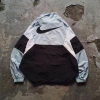 ราคา เสื้อกันลม Nike โลโก้ใหญ่ (24801256007)