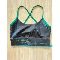 ราคา Reebok speed wick สปอร์ตบรา ไม่มีฟองน้ำ สีดำลายกราฟิกสีเขียวและฟ้า สายไขว้หลัง (50363985264)