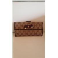 ราคา กระเป๋าตังค์แบรนด์ gucci มือสองของแท้ (มือสอง) (360929522)