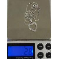 ราคา สร้อยทองคำขาว18k จี้เพชร เพชรกุกลาบไฟ (มือสอง) (360880670)