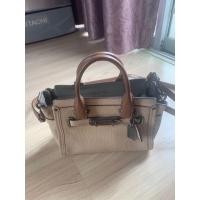 ราคา Coach swagger 21 มือสอง สภาพดี ไม่มีตำหนิ (มือสอง) (360855136)