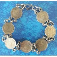 ราคา เหรียญ5สต.พ.ศ.2500 เลี่ยมเป็นสร้อยข้อมือ (มือสอง) (360851152)