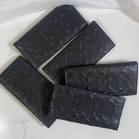 ราคา กระเป๋าสตางค์coach ใบยาวลาย C นูนรุ่นใหม่ (มือหนึ่ง) (360584785)