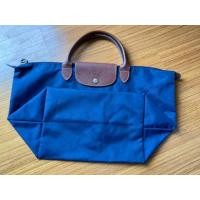 ราคา ส่งต่อ LongChamp หูสั้น size M ของแท้แน่นอน (มือสอง) (360569631)