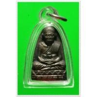 ราคา @ หลวงพ่อทวดหลังหนังสือ วัดม่วง รุ่นแรก ปี 2505 เนื้อทองผสมรมดำสวยมาก @ (51180)