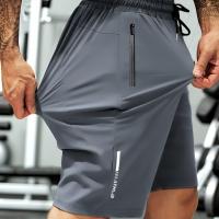 ราคา TEMU กางเกงขาสั้นผู้ชายเนื้อผ้าไฟเบอร์เย็นสบาย ยืดหยุ่นสูง เหมาะสำหรับกิจกรรมกลางแจ้งและออกกำลังกาย พร้อมเชือกผูกเอวและกระเป๋าซิป (17592475800902)