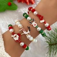ราคา TEMU ชุดสร้อยข้อมือสุนัขคริสมาสต์ 4 ชิ้น - หยิบเซนต้าน่ารัก, กวาง, ถุงมือพร้อมไข่มุกปลอม - เครื่องประดับแฟชั่นไม่มีโลหะสำหรับใส่ประจำ - ของขวัญวันหยุดสำหรับทุกเพศ สร้อยข้อมือที่ใส่ได้ทุกฤดูกาล (175927