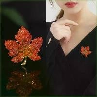 ราคา เข็มกลัดสำหรับผู้หญิง ระดับไฮเอนด์ ดีไซน์ใบเมเปิ้ล Rhinestone สีแดงส้มใหม่ เครื่องประดับเข็มกลัดเฉพาะ meecap หมวกแบรนด์แท้มือสอง หมวก polo แท้ หมวก โม่ง meecap หมวกแบรนด์แท้ (1731649227484465108)