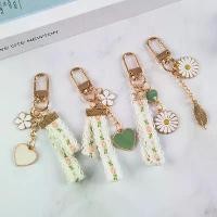 ราคา พวงกุญแจดอกไม้ 1 ชิ้น เชือกเส้นเล็ก ริบบิ้น จี้ดอกเดซี่ พวงกุญแจห้อยกระเป๋า เครื่องราง (1729696452256696602)