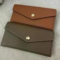 ราคา กระเป๋าสตางค์ทรงยาว long wallet หนังวัวแท้ (1731941876377225805)