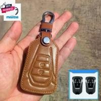 ราคา ซองหนังแท้ ใส่กุญแจรีโมทรถยนต์ รุ่นโลโก้เหล็ก ใหม่! Mazda BT-50 2020-2024 Smart Key แนะนำ (1731522991907964091)