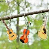 ราคา เครื่องประดับนักดนตรี, XIA MENG, พวงกุญแจกีต้าร์ Ukulele, จี้โมเดลกีต้าร์ Violin Cello และ Cello, จี้กระเป๋ากุญแจโมเดลกีต้าร์ไฟฟ้า Trung Nguyen Djembe (1732295714881898137)
