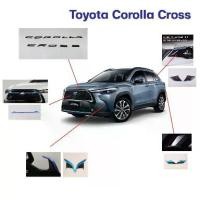 ราคา Toyota Corolla Cross ครอบกระจังหน้า/คิ้วกันชนหน้า/ติ้วกันชนหลัง/มือเปิด Carbon/logo ฝากระโปรงหน้า (1732571660971705768)