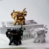 ราคา เชิงเทียนหลังช้าง ดีไซน์สร้างสรรค์และน่ารัก งานฝีมือเรซิน ตลก เชิงเทียนช้าง สไตล์ยุโรป ทำด้วยมือ เทียนหอม ของตกแต่งโต๊ะ (1732075882936174276)