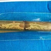 ราคา ตะกรุดลูกปืน มหาอุตม์ เสือหัวขาด ขนาด 5.8 เซนติเมตร หลวงพ่อพัฒน์ ปุญญกาโม ด้านในตะกรุดบรรจุเม็ดลูกปืน และ ยันต์มหาอุต (ตะกร้อ) (1732001860334552103)