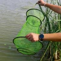 ราคา ตะกร้าตกปลาและกุ้งแห้งเร็ว ป้องกันการพันกัน หนาและพับได้ เหมาะสำหรับป้องกันปลาและปูล็อบสเตอร์ พร้อมถุงตาข่ายกันกระโดด อุปกรณ์ตกปลา มาใหม่ Sports ออกกำลังกาย ตะกร้อ (1731034860585191812)