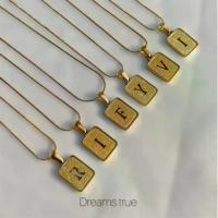ราคา สร้อยตัวอักษร A-Z กากเพชร ทรายสีทอง กลวง สร้อยคอสเตนเลส 18K จี้ตัวอักษร สีทอง สําหรับผู้หญิง (1730827669792983994)