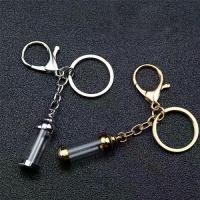 ราคา พวงกุญแจขวดแก้วทรงกระบอก, ตรายาง, แก้วใสและเหล็ก, พวงกุญแจเสน่ห์นำโชค, ของที่ระลึก, ฝาเกลียวแบบเปิดได้, จี้ขวดขอพร (1732146420170982982)