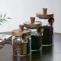 ราคา [เก็บเงินปลายทาง] กระปุกอาหารแก้วพร้อมฝาไม้และช้อน ตราประทับอากาศสุญญากสำหรับน้ำตาล กาแฟ ถั่ว และลูกอม (1733440254642652409)