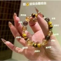 ราคา จินบา กำไลซิทรินธรรมชาติแท้ดีไซน์สวย คริสตัลสีทองตาเสือใหญ่ ประกอบด้วยซิทรินและคริสตัลสีขาว แท้ keychain (1733410410984801556)