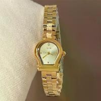 ราคา 2026IEKE niche arched small gold watch with steel strap, women's niche light luxury exquisite fashion quartz wristwatch in ins style (1734353114776438296)