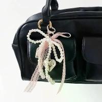 ราคา พวงกุญแจโบว์มุกลูกไม้, โบว์มุกผู้หญิง, พวงกุญแจจี้กระเป๋า, พวงกุญแจเสน่ห์สาวกระเป๋าเป้สะพายหลัง, จี้กระเป๋ารูปหัวใจ, พวงกุญแจรูปลูกปัด, จี้โบว์, เหมาะสำหรับของขวัญ, กระเป๋าสตางค์ (1732590778627687698)