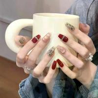 ราคา ขายดี เล็บทำมือ สวมใส่ได้ ปีใหม่ สีแดง ตาแมว สไตล์สั้น หรูหราเบา ชุบทอง เพชรบด เล็บบรรยากาศ ศิลปะเล็บฟอกสีขาวระดับสูง (1734307691405411368)