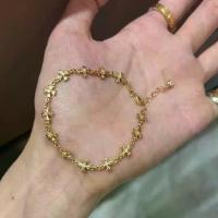ราคา สร้อยข้อมือ ฝังเพชร ลายไม้กางเขนและดอกไม้ สีทอง (1733032684213077288)