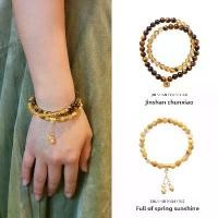 ราคา สร้อยข้อมือหินตาเสือ, วัสดุธรรมชาติ, คริสตัลสีเหลือง, โชคดี, สร้อยข้อมือซ้อนวงกลมคู่, สร้อยข้อมือคริสตัล Acai สีเหลือง (1732919270918292869)