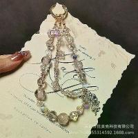 ราคา (COD) Light Luxury High-End Crystal Phone Chain Fashion Flower Pendant Beaded Double Chain Phone Lanyard Boutique Handheld Chain 2026 (1733734220023301875)