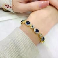 ราคา ส่งฟรี สร้อยข้อมือ ไพลินล้อมเพชรคั่นดอกไม้ เครื่องประดับไทย พูนทรัพย์ มีใบรับประกัน งานปราณีต งดงาม HD140H200 (1729736377425693650)