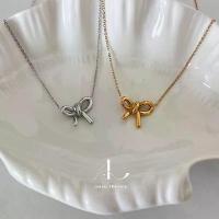 ราคา สร้อยสแตนเลส aura theory cute ribbon necklace (1734418400869779199)