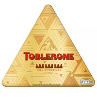 ราคา ของขวัญปีใหม่ ทอปเบอโรนเฟสทีฟโกลด์แพ็คช็อกโกแลตนมผสมน้ำผึ้งและอัลมอนด์นูกัต 288กรัม New Year Gift Set Toblerone Festive Tin Chocolate 288g. (7622202347825)