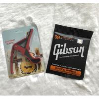 ราคา SET 2 สุดค้ม สายกีตาร์โปร่ง คาโป้ ชุดสุดคุ้มค่าคุ้มราคา สายกีตาร์โปร่งGIBSON คาโป้เหล็กอย่างดี สินค้าดีมีคุณภาพพร้อมส่ง เร็วมาก (9694386332)