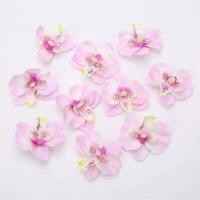 ราคา 30 ดอกกล้วยไม้เทียมหัวกล้วยไม้ปลอมกล้วยไม้ปลอมสำหรับการตก แต่งงาน แต่งงาน แต่งงานชุดหูฟังตก แต่ง ที่มีคลิปของขวัญงานฝีมือ (12880380371)