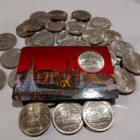 ราคา แผงเล็กพร้อมเหรียญ ปี 2525 หลังวัด ไม่ผ่านใช้ (16266633269)