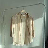 ราคา เสื้อเชิ้ต Uniqlo ลายตาราง มือสอง (21307524873)